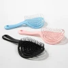 Factory direct sales of lollipop round hollowed-out colored plastic massage combs details Picture